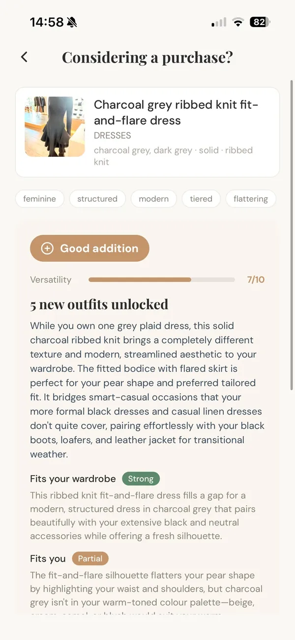 Considering a purchase: a charcoal ribbed knit dress rated “Good addition”, versatility 7 out of 10, 5 new outfits unlocked.
